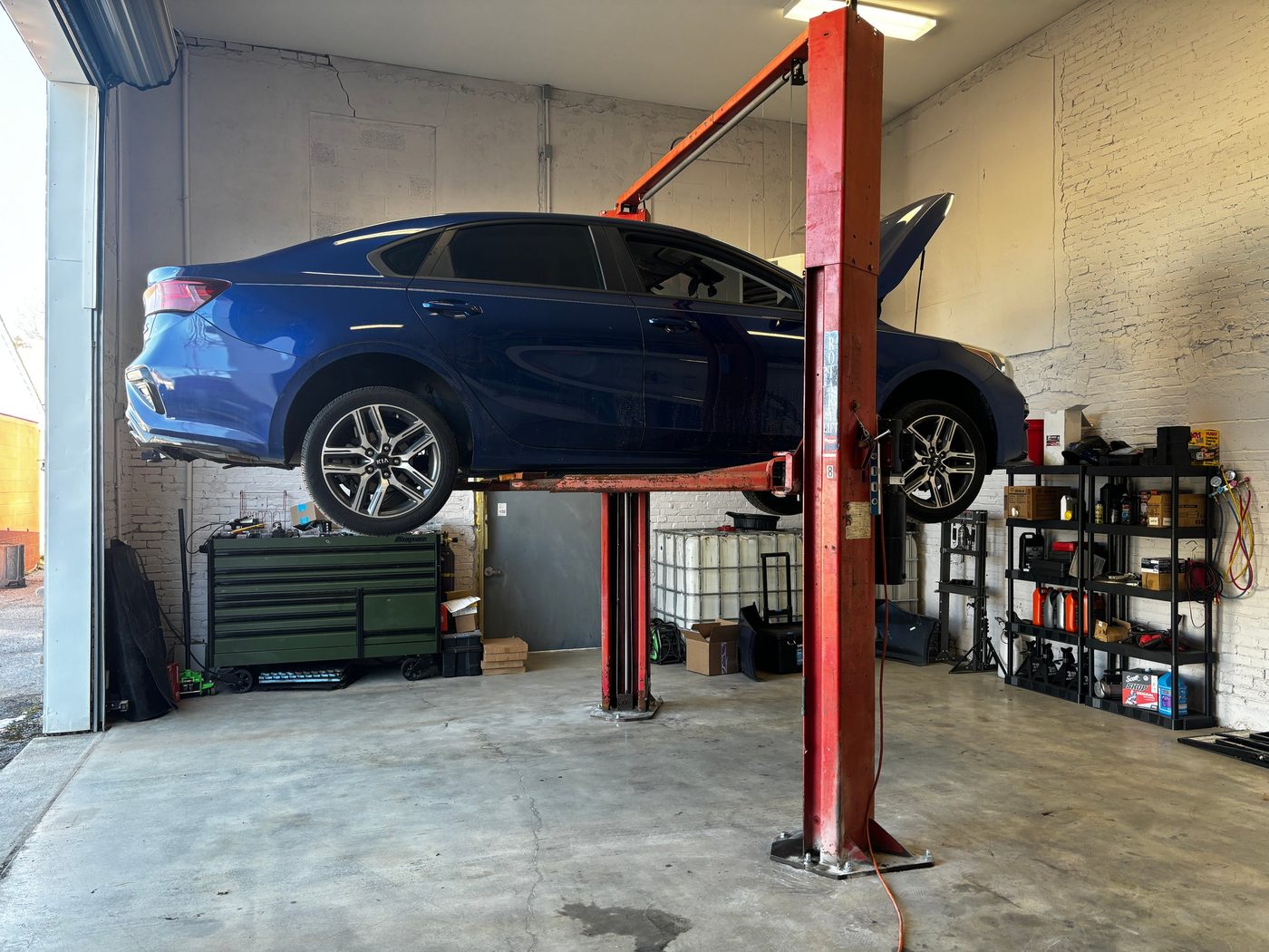 A car on the lift at Pristine Auto Works